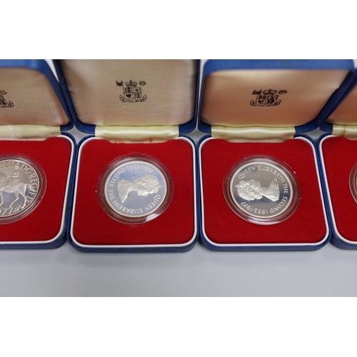 518 - Royal Mint proof silver coins - three QEII UK Silver Jubilee crowns and four Commonwealth crowns (7)... 