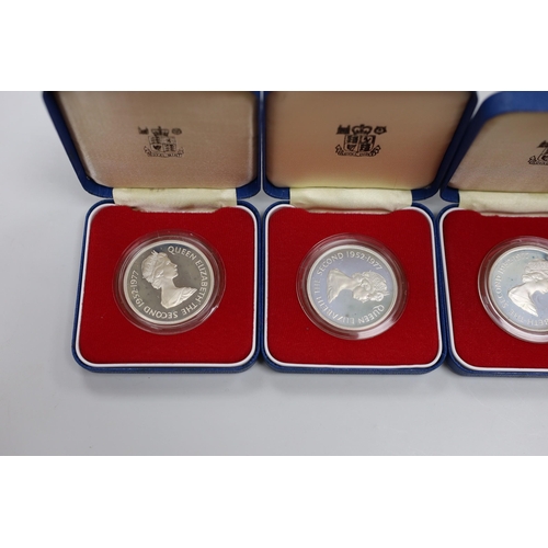 521 - Eight Royal Mint Commonwealth commemorative proof silver crowns