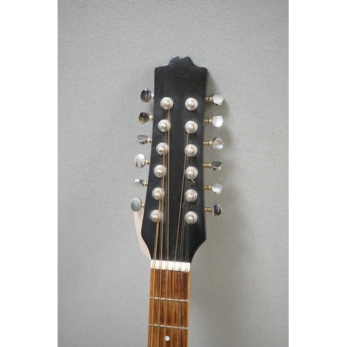 538 - A 12 string acoustic guitar, unknown maker, repaired by John Degay of Degay Guitars