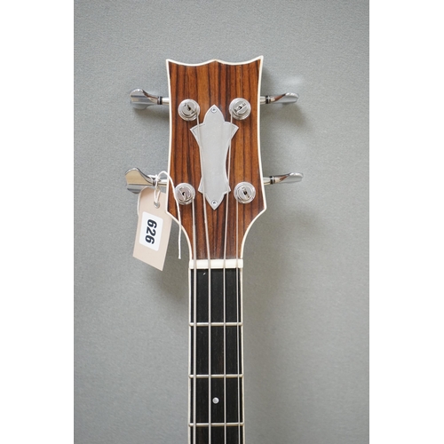 539 - An Acoustic bass guitar, made by John Degay of Degay Guitars