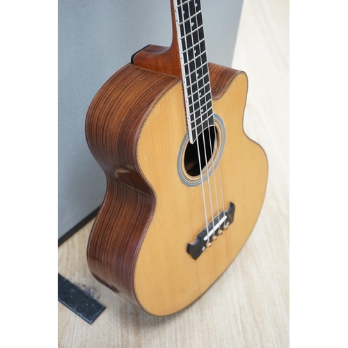 539 - An Acoustic bass guitar, made by John Degay of Degay Guitars