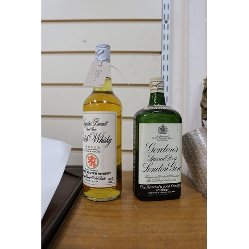 543 - A bottle of (approx 70cl) Gordon's Special Dry London Gin, a bottle of 75cl Augustus Barnett Special... 