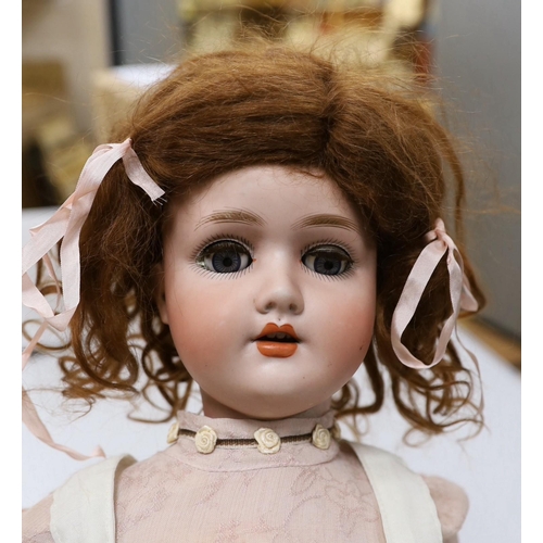 550 - An early 20th century Simon Halbig bisque headed doll