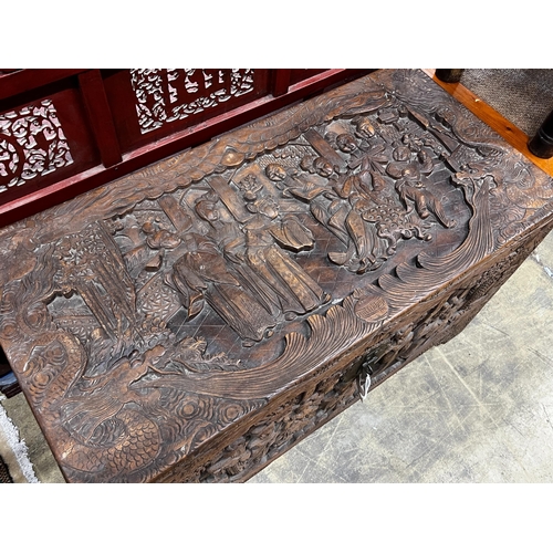 58 - A Chinese carved camphorwood trunk, length 104cm, depth 52cm, height 61cm