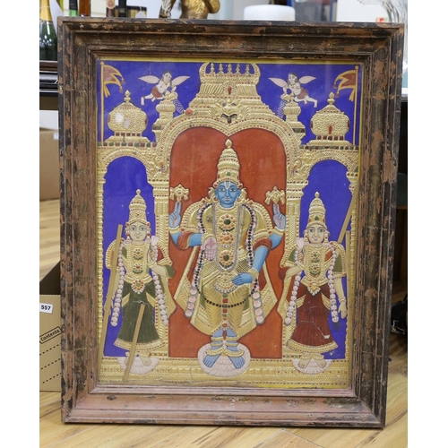 672 - Indian School c.1900, a painted and gilt panel of Shiva with attendants, 74 x 59cm