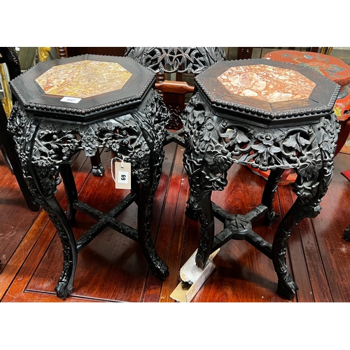 69 - A near pair of Chinese marble top octagonal carved hongmu vase stands, width 40cm, height 62cm... 