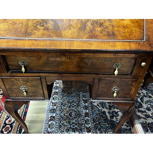 75 - An early 20th century Queen Anne revival walnut bureau, width 76cm, depth 46cm, height 103cm