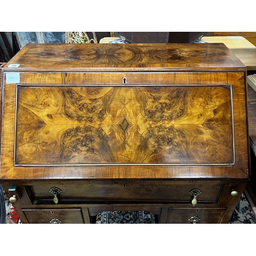 75 - An early 20th century Queen Anne revival walnut bureau, width 76cm, depth 46cm, height 103cm