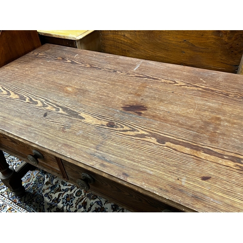 79 - A Victorian stained pitch pine two drawer serving table by repute from Balmoral Castle kitchens, len... 