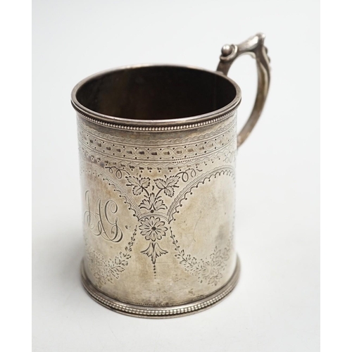 803 - A Victorian engraved silver christening mug, Charles Stuart Harris, London, 1881, height 92mm, with ... 