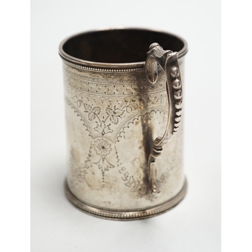 803 - A Victorian engraved silver christening mug, Charles Stuart Harris, London, 1881, height 92mm, with ... 