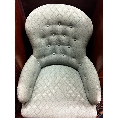 99 - A Victorian upholstered spoon back armchair, width 66cm, depth 84cm, height 79cm