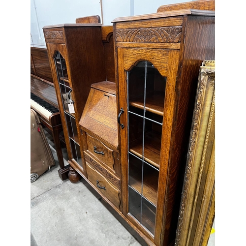 1007 - An early 20th century oak bureau bookcase, length 120cm, depth 28cm, height 154cm