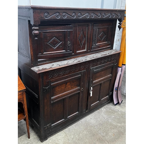 1014 - A 17th century oak court cupboard, width 139cm, depth 57cm, height 146cm