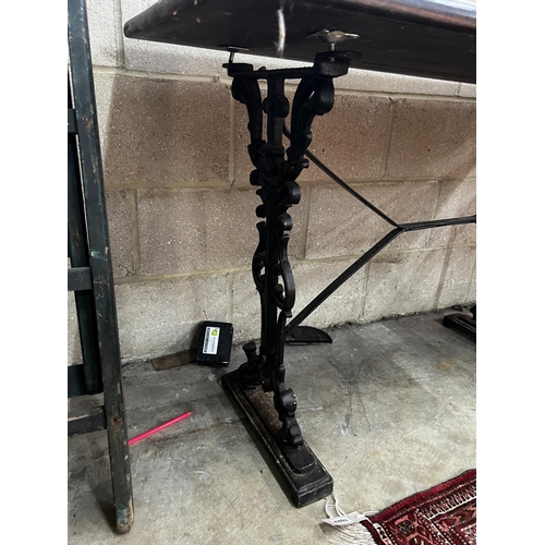 1021 - Two Victorian style cast metal stained wood topped tavern tables, larger width 120cm, depth 60cm, he... 