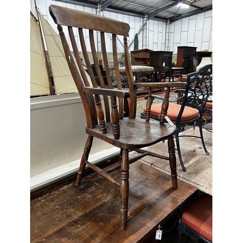 1027 - A Victorian elm and beech lathe back armchair, width 55cm, depth 47cm, height 113cm