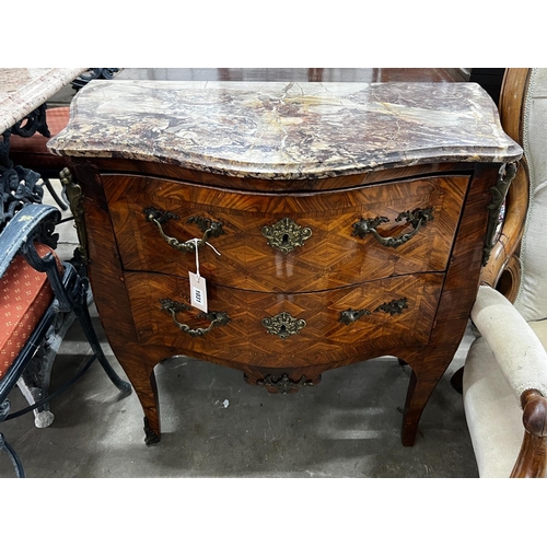 1031 - A small 19th century French transitional style gilt metal mounted kingwood marble topped two drawer ... 