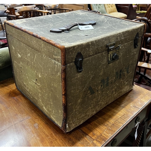 1035 - A Victorian canvas covered travelling trunk, width 50cm, depth 46cm, height 37cm