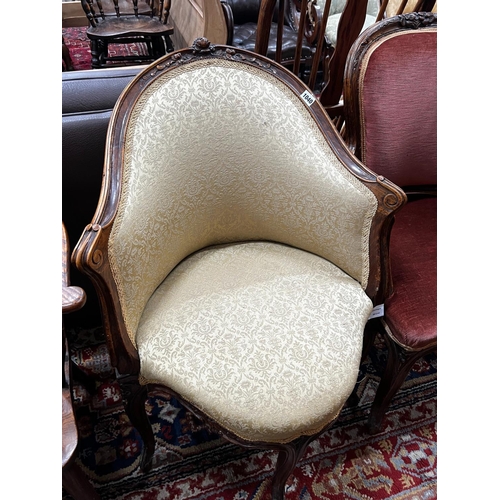 1040 - A late 19th century French walnut corner elbow chair, width 65cm, depth 49cm, height 90cm