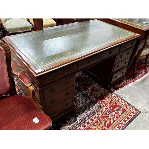 1044 - An early 20th century mahogany leather topped pedestal desk, width 137cm, depth 75cm, height 74cm... 