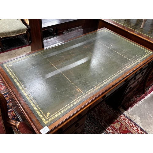 1044 - An early 20th century mahogany leather topped pedestal desk, width 137cm, depth 75cm, height 74cm... 