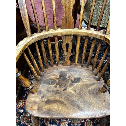 1050 - A Victorian ash, elm and beech Windsor armchair, width 57cm, depth 38cm, height 110cm