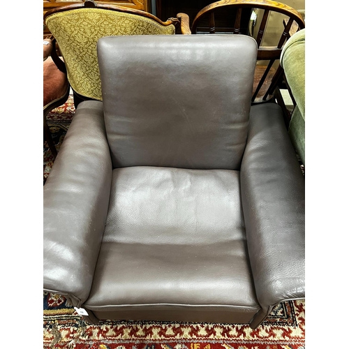 1051 - A De Sede brown leather armchair, width 92cm, depth 83cm, height 80cm