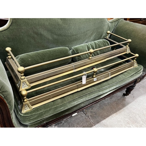 1053 - A pair of Victorian style telescopic brass fenders