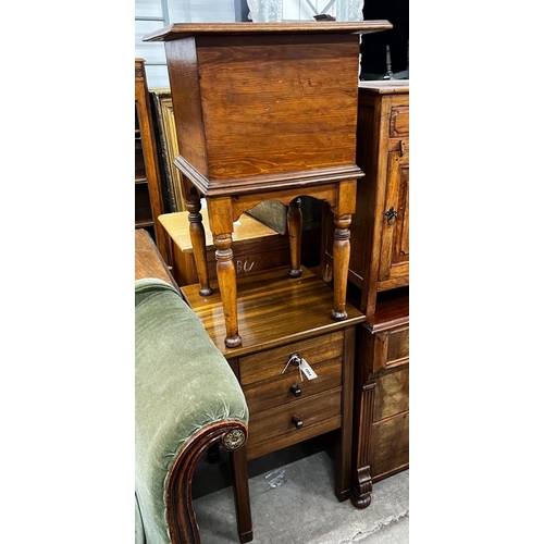 1054 - A mid century teak three drawer bedside chest, height 77cm together with an oak and pine workbox... 