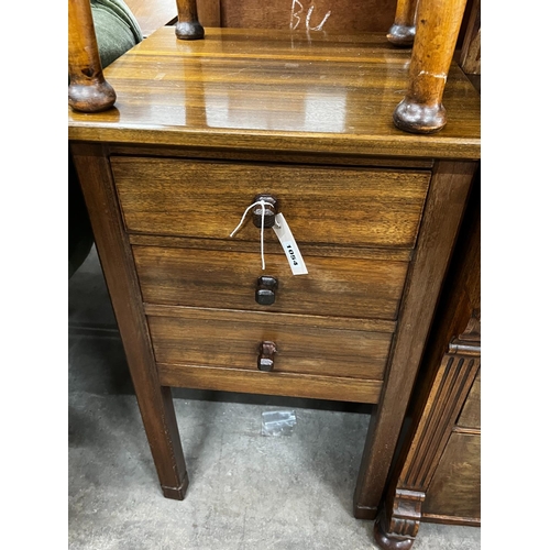 1054 - A mid century teak three drawer bedside chest, height 77cm together with an oak and pine workbox... 