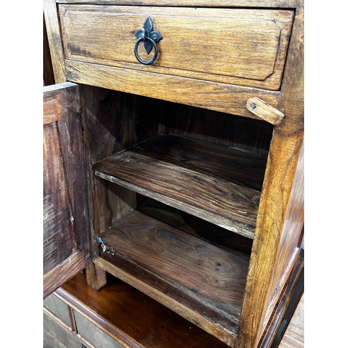 1055 - A pair of Indonesian hardwood bedside cabinets, width 43cm, depth 31cm, height 64cm