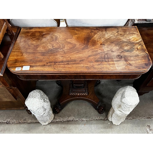 1057 - A William IV rectangular mahogany folding tea table, width 92cm, depth 46cm, height 77cm