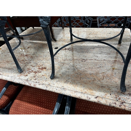 1061 - A rectangular cast metal marble topped garden table, length 140cm, depth 100cm, height 75cm and eigh... 