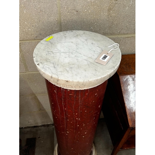 1068 - A faux porphyry column with circular marble top, height 104cm