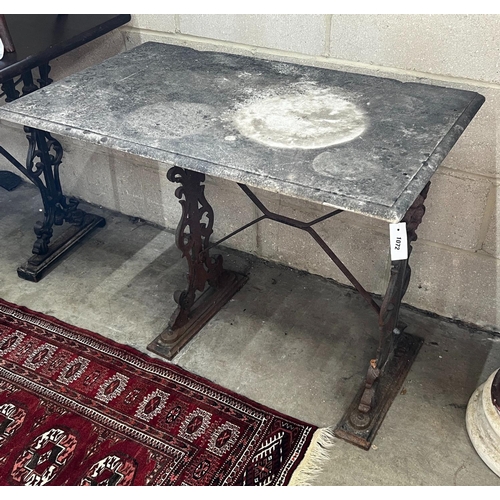 1072 - A rectangular cast iron marble topped garden table, length 92cm, depth 54cm, height 69cm