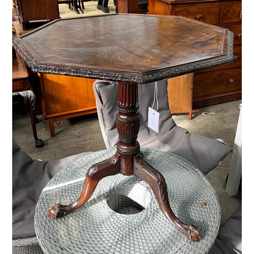 1073 - A George III and later octagonal mahogany tilt top tripod tea table, width 68cm, height 74cm