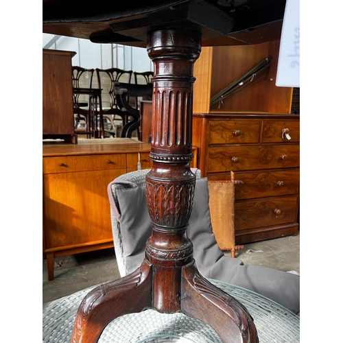 1073 - A George III and later octagonal mahogany tilt top tripod tea table, width 68cm, height 74cm