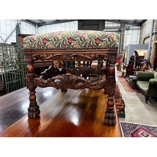 1082 - An early 20th century Jacobean revival carved beech dressing stool, length 60cm, depth 48cm, height ... 