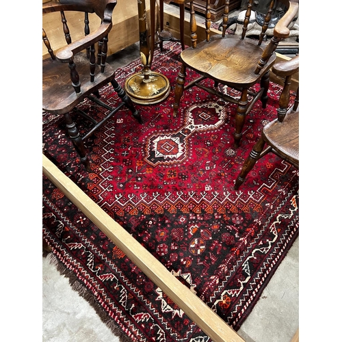 1091 - A Hamadan red ground carpet, 240 x 180cm