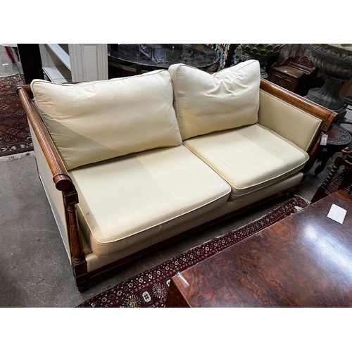 1100 - A reproduction walnut and beech two seater settee, length 174cm, depth 86cm, height 74cm