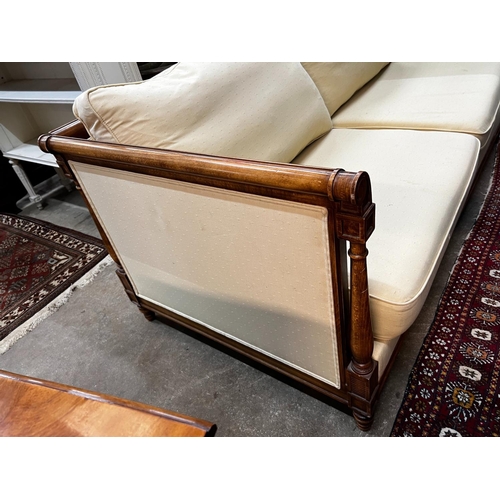 1100 - A reproduction walnut and beech two seater settee, length 174cm, depth 86cm, height 74cm