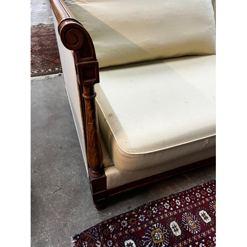 1100 - A reproduction walnut and beech two seater settee, length 174cm, depth 86cm, height 74cm