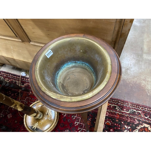 1111 - An Edwardian inlaid mahogany jardiniere with brass liner, height 93cm