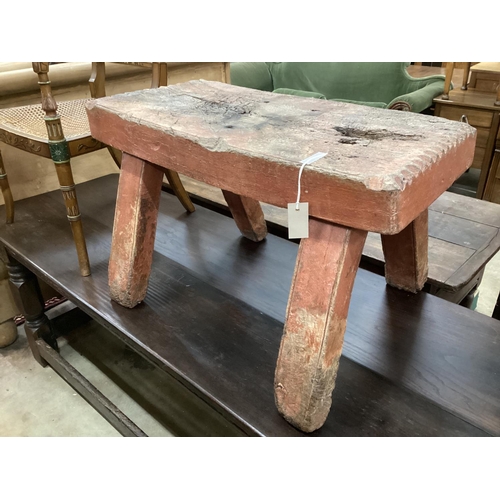 1114A - A 19th century Spanish pig bench, width 85cm, depth 39cm, height 52cm