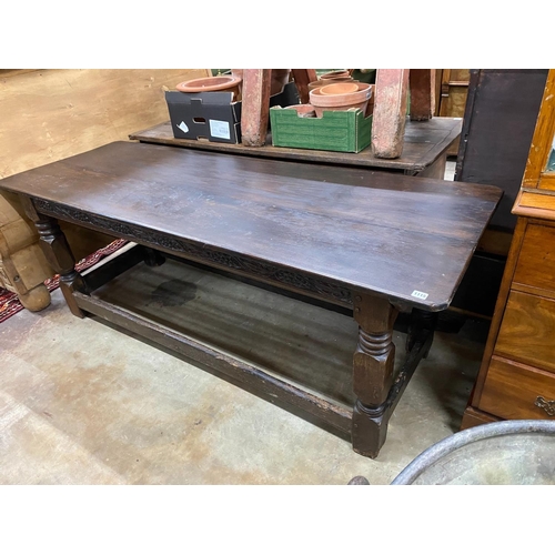 1115 - A 17th / 18th century rectangular oak refectory dining table with later planked top, width 190cm, de... 