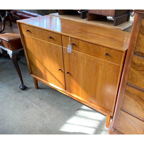 1128 - A mid century teak sideboard, length 122cm, depth 43cm, height 91cm