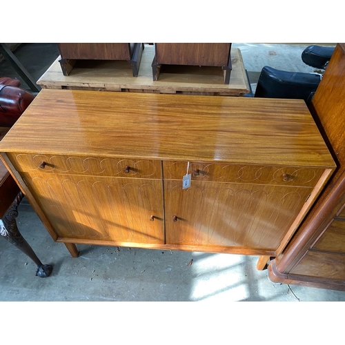 1128 - A mid century teak sideboard, length 122cm, depth 43cm, height 91cm