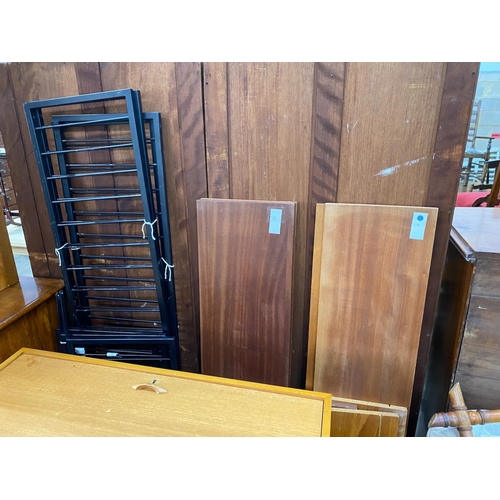 1130 - Four mid century teak ladder shelving units, disassembled