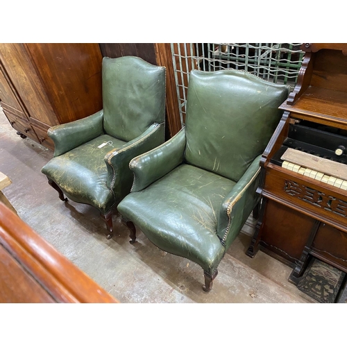 1139 - A pair of Victorian studded green leather library chairs on cabriole legs, width 69cm, depth 70cm, h... 