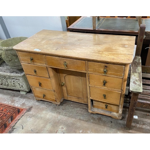 1142 - A Victorian pine kneehole dressing table, width 112cm, depth 55cm, height 74cm